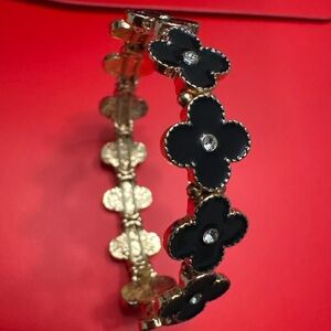 Elegant Black and Gold Floral Bracelet